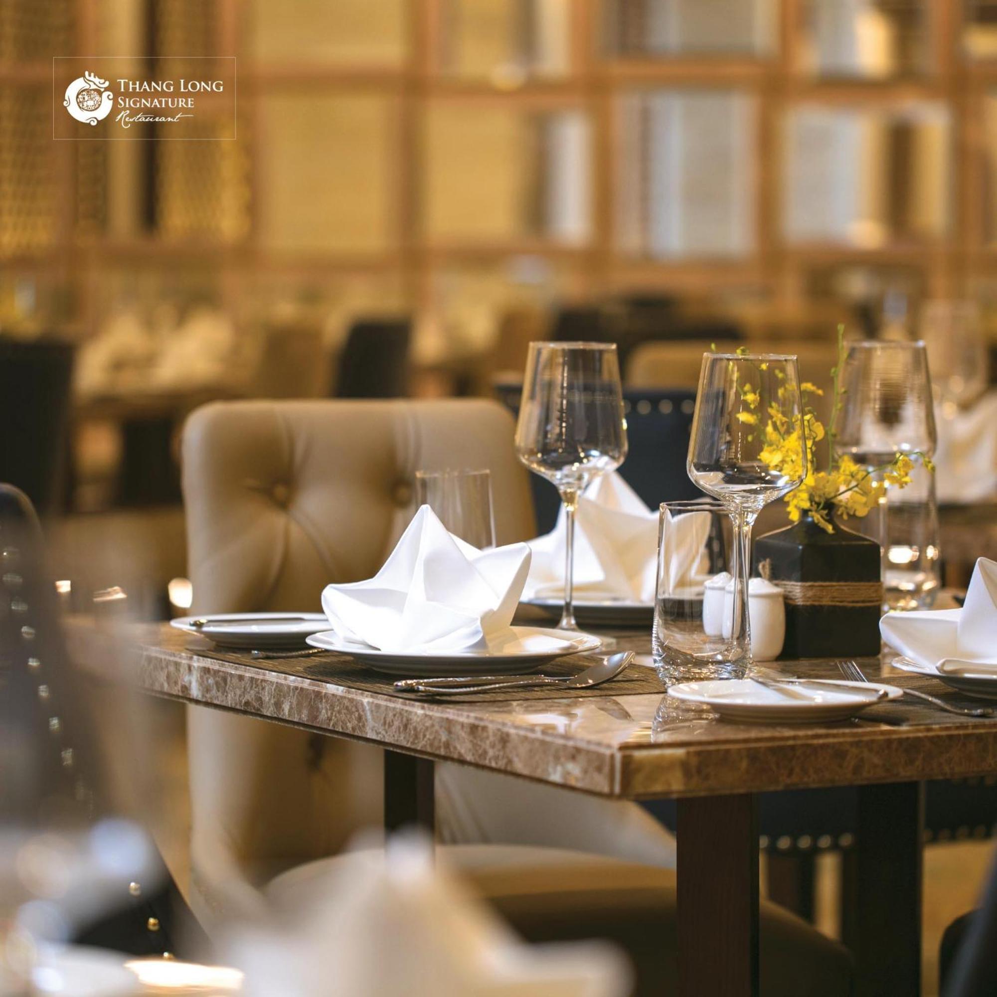 The Oriental Jade Hotel Hanói Exterior foto A table set for fine dining